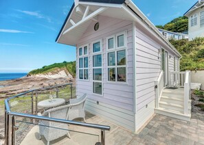 Terrace/patio - This chic country style beach hut is ideal for a romantic escape by the sea. (Hele Bay, Ilfracombe)