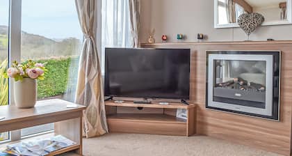 Contemporary, stylish caravan with one double and one twin.