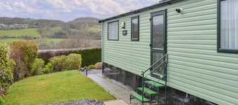 Contemporary, stylish caravan with one double and one twin.