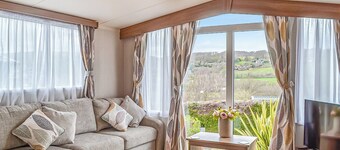 Contemporary, stylish caravan with one double and one twin.
