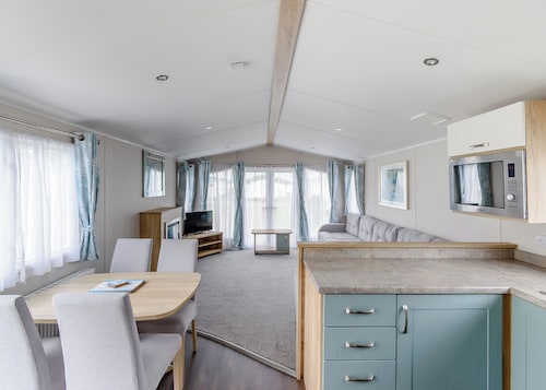 12ft-wide very comfortable and spacious caravan with one double and one twin.