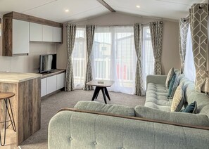 Living area - Contemporary caravan with one double and one twin. (LLwyngwril, Gwynedd)