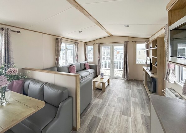 Living area - Modern and contemporary 12ft wide caravan with one double and one twin. (Bleadon, Weston-Super-Mare)
