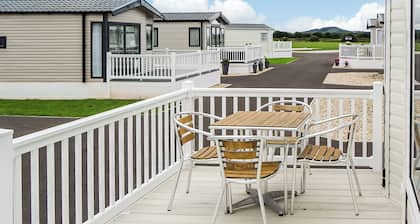 Modern and contemporary 12ft wide caravan with one double and one twin.