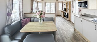 Modern and contemporary 12ft wide caravan with one double and one twin.