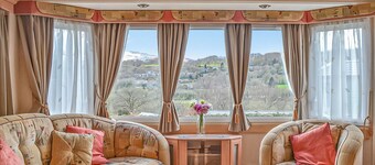 Traditional yet comfortable caravan with one double and two twins.