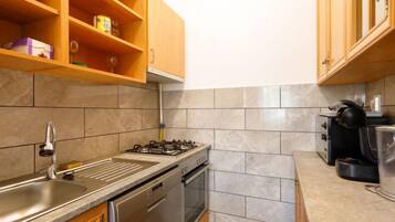 Fridge, microwave, cookware/dishes/utensils