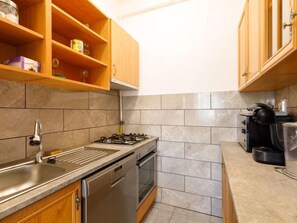Fridge, microwave, cookware/dishes/utensils