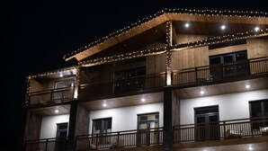 A multi-story hotel with a sign reading "FOREST HOTEL". - FORest 1961 Hotel & Restaurant (Vanadzor)