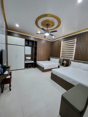 Deluxe Twin Room, 2 Queen Beds | Minibar, desk, free WiFi, bed sheets - Nam Hong Hotel (Binh Xuyen)