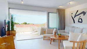 Premium Apartment, 2 Bedrooms, Garden View | Living area | 55-inch flat-screen TV with satellite channels, TV, heated floors - Villa Zoe (Komiza)