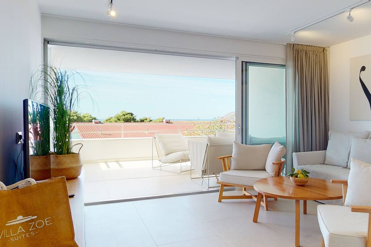 Appartement Prestige, 2 chambres, vue sur le jardin | Aire de séjour | Téléviseur à écran plat de 55 po avec télévision par satellite