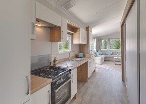 Fridge, oven, stovetop, toaster - 12ft-wide very comfortable and spacious caravan with two twins. (Roman Bank, Skegness)