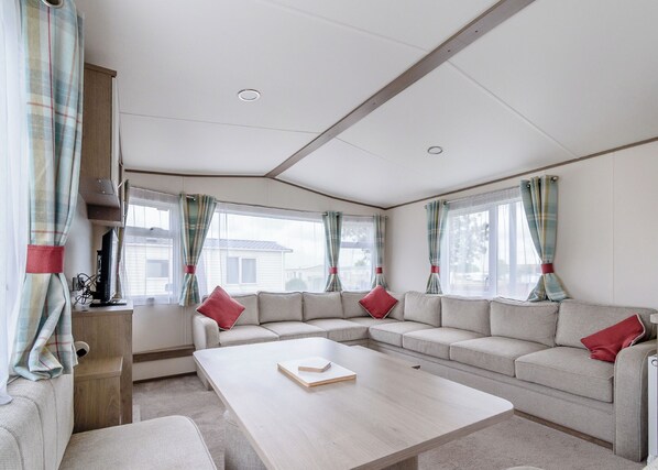 Living area - 12ft-wide very comfortable and spacious caravan with one double and two twin. (Roman Bank, Skegness)