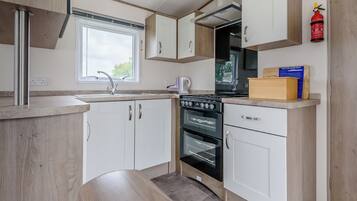 Refrigerador, horno, parrilla de estufa y tostadora