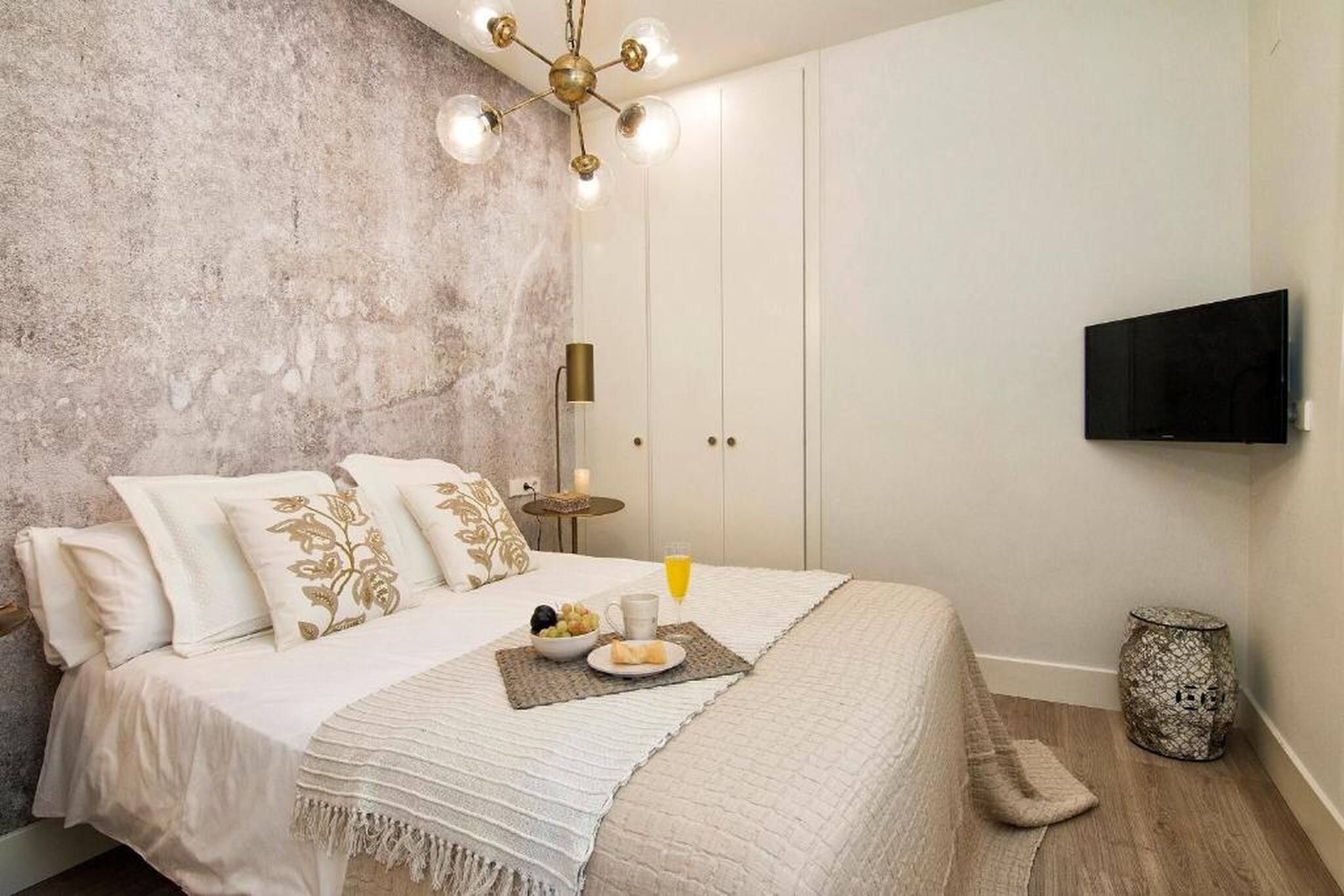 1 slaapkamer, een strijkplank/strijkijzer, internet, beddengoed
