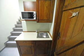 Mini-fridge, cookware/dishes/utensils