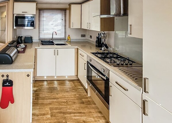 Fridge, toaster, cookware/dishes/utensils