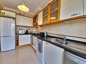 Fridge, microwave, oven, dishwasher