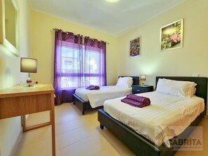 2 slaapkamers, een strijkplank/strijkijzer, internet, beddengoed