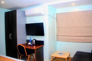 غرفة عادية | 1 غرفة نوم وأغطية فراش متميزة ومكتب ومساحة عمل للكمبيوتر المحمول