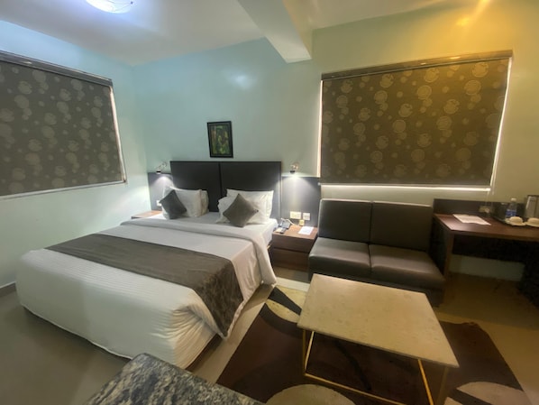 غرفة ديلوكس | 1 غرفة نوم وأغطية فراش متميزة ومكتب ومساحة عمل للكمبيوتر المحمول