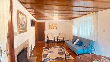 Comfort House | Living area | 20-inch flat-screen TV with cable channels, TV