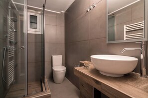 Bathtub, hair dryer, towels