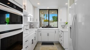 Coffee/tea maker, fridge, microwave, oven