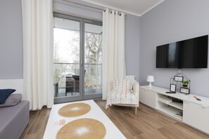 Departamento, 1 habitación, balcón, frente al mar | Sala de estar