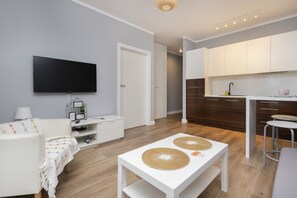 Departamento, 1 habitación, balcón, frente al mar | Sala de estar