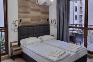 2 dormitorios, tabla de planchar con plancha, wifi gratis y ropa de cama