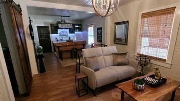 Signature Cottage, 2 Bedrooms | Living room | 43-inch Smart TV with cable channels, TV, Netflix