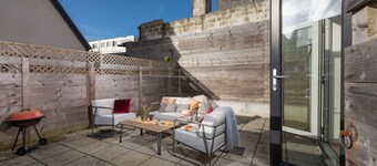 A stylish eco mews house with four bedrooms, enclosed garden and parking in Newquay