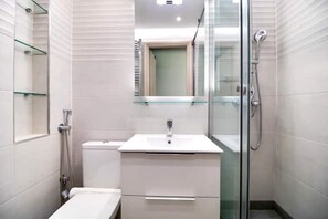 Shower, hair dryer, towels, soap