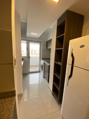 Full-size fridge, microwave, oven, espresso maker