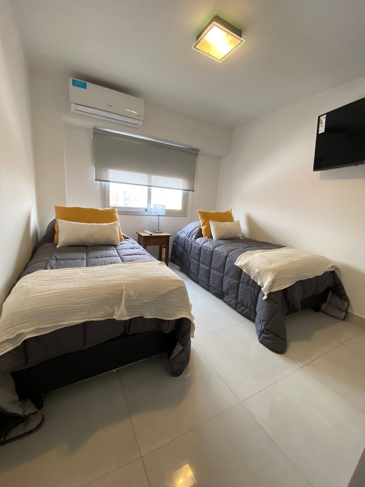 Down comforters, pillowtop beds, in-room safe, blackout drapes