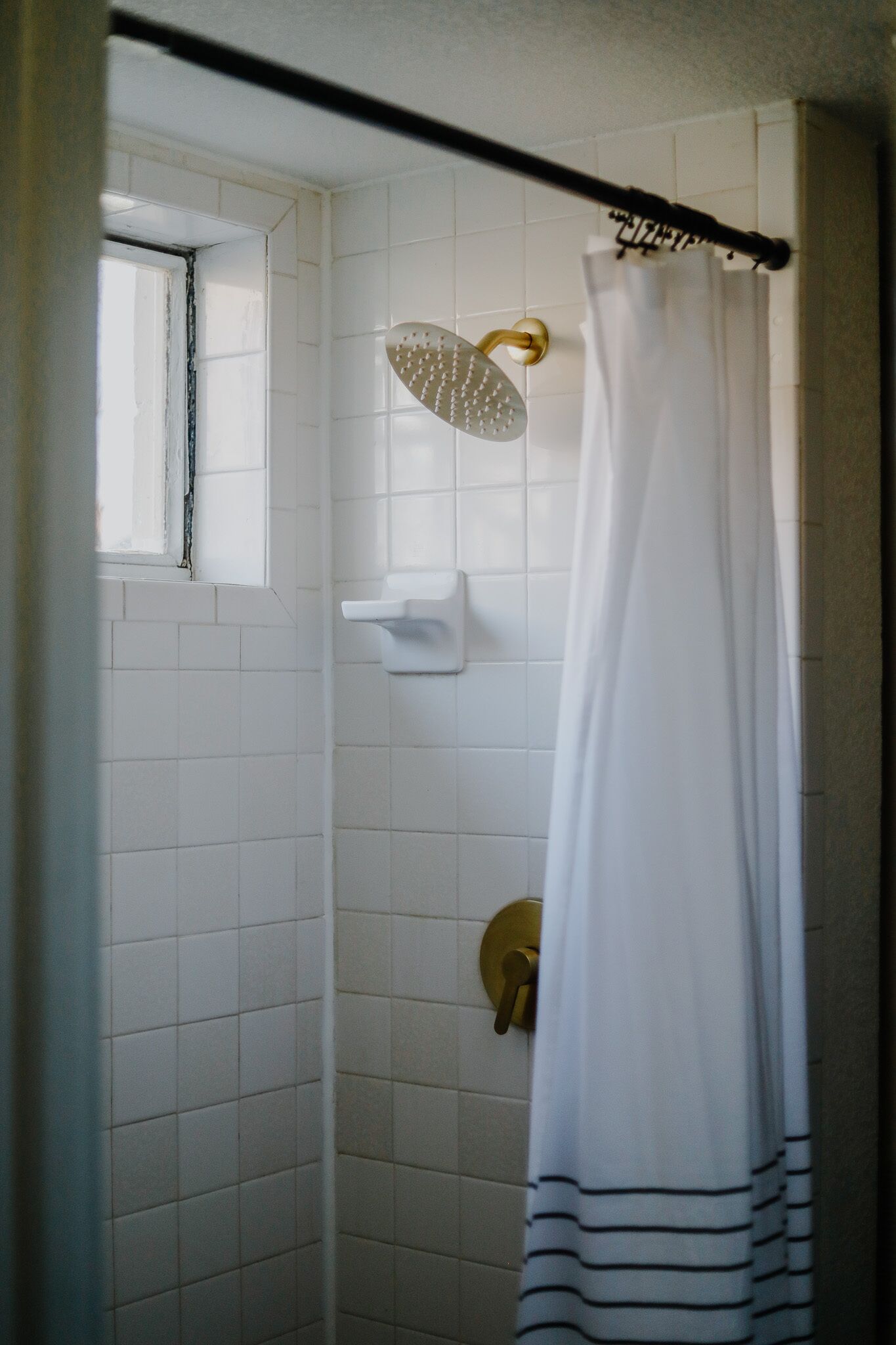 Shower, hair dryer, towels, toilet paper