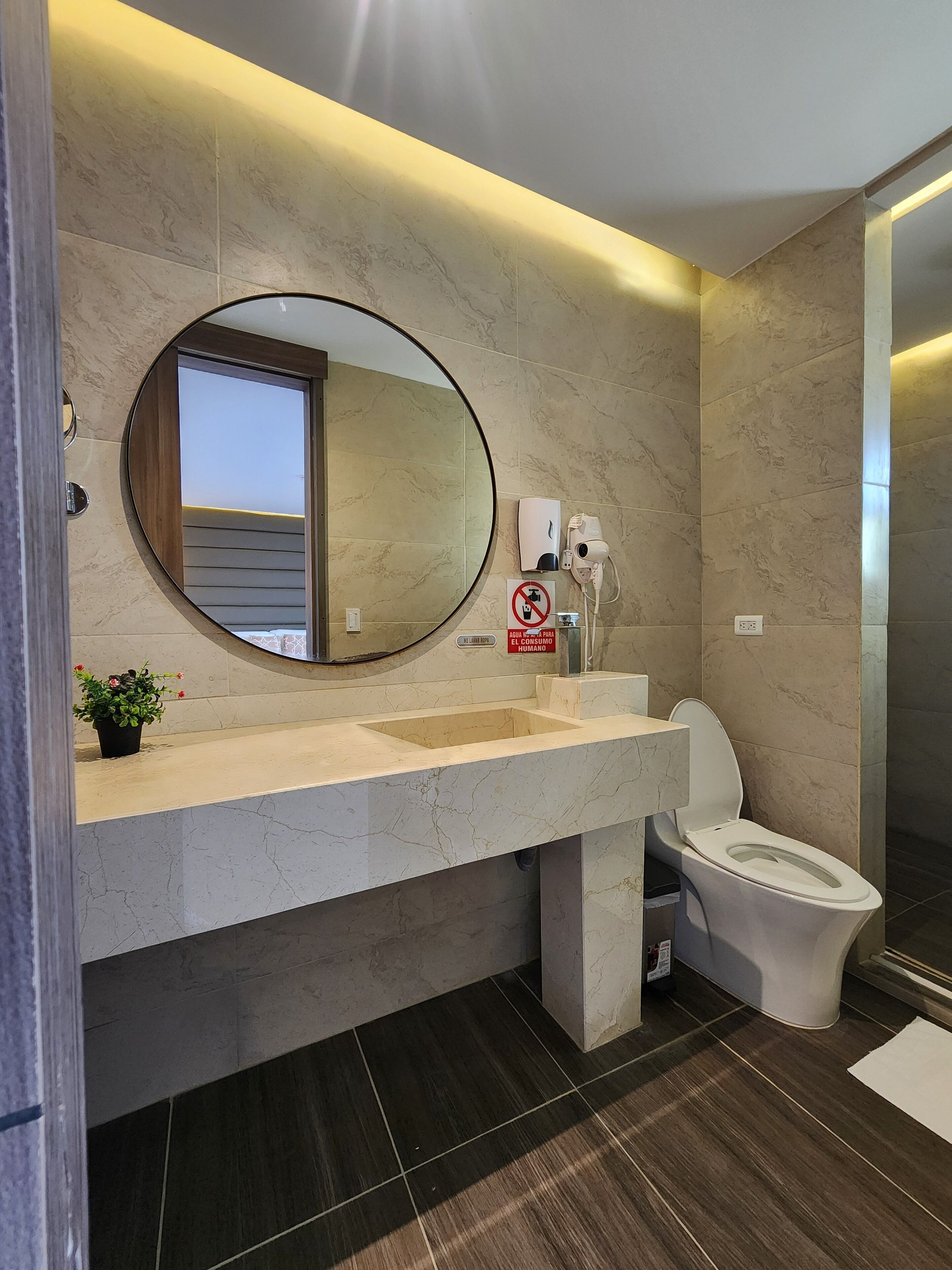 Shower, rainfall showerhead, towels, soap