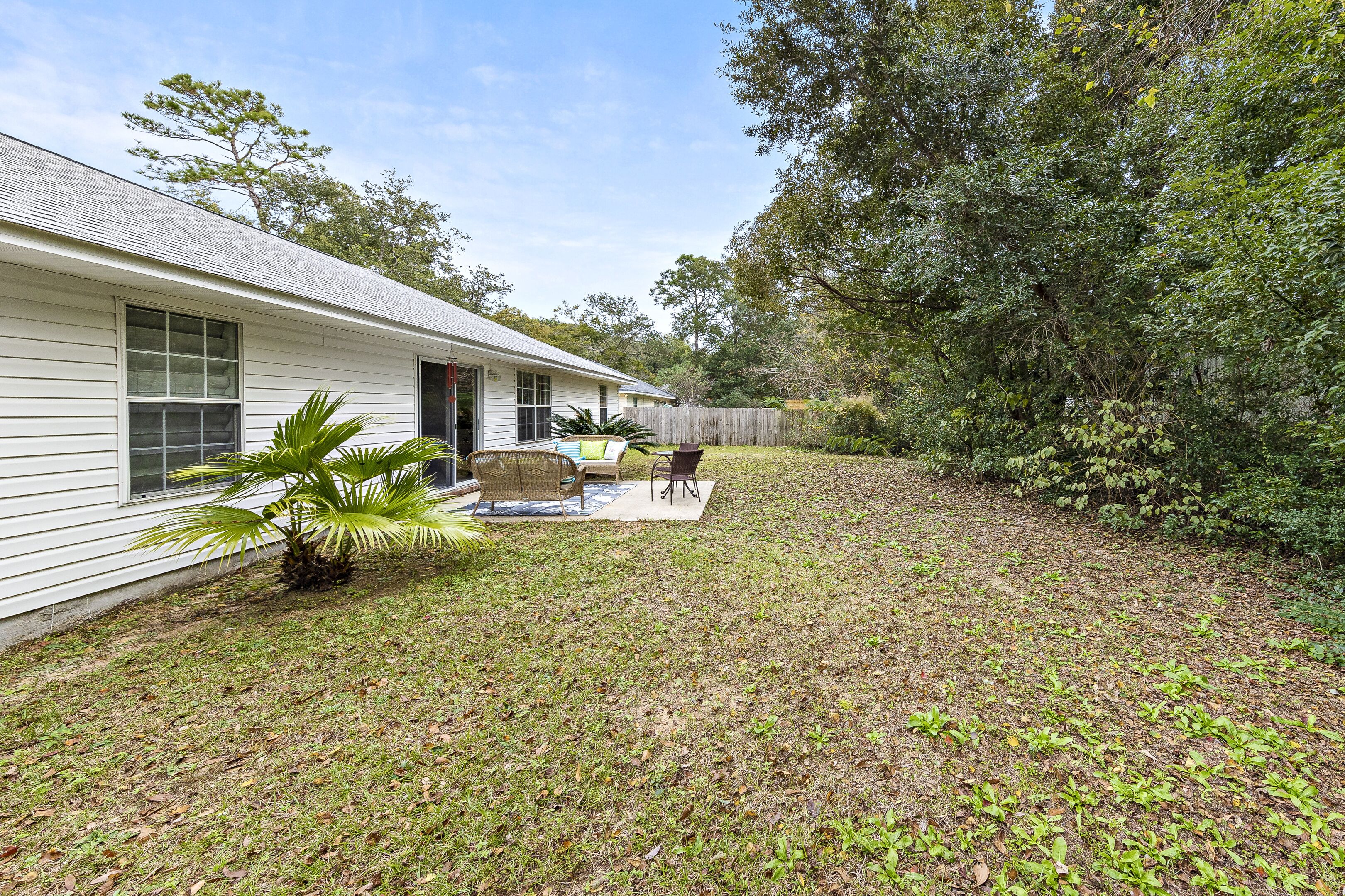 A single-story house with a covered patio area.