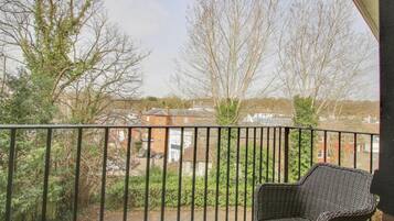 Apartamento, varias camas | Jardines del alojamiento