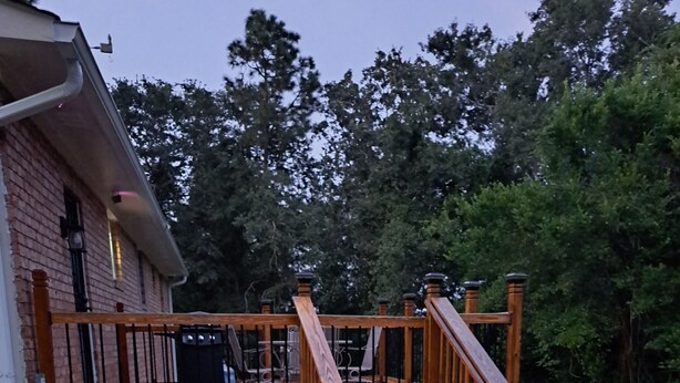 A wooden deck with a staircase leading to a house. - Close to Fort Eisenhower & Augusta Golf Course (Hephzibah)
