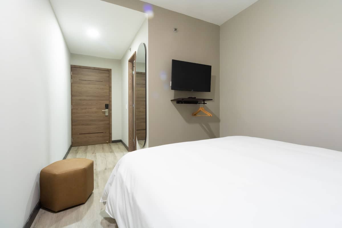 Kamar Double Standar | Wi-Fi gratis dan seprai linen