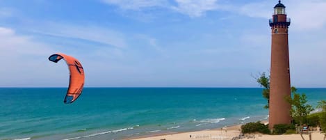 On the beach, sun-loungers, beach towels