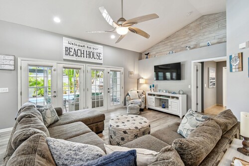 Tropical 4 Bed Pool Home Min to Beaches! Available Now