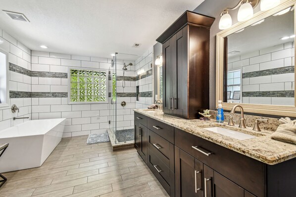 Combined shower/tub, hair dryer, towels, soap