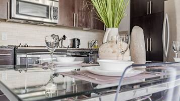 Family Condo | Private kitchen | Full-size fridge, microwave, oven, stovetop