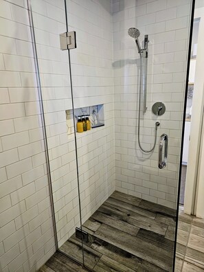 Shower, towels, soap, toilet paper