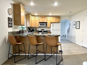 Fridge, microwave, oven, stovetop - Modern, cozy home in private beach community Admirals Cove (Coupeville)