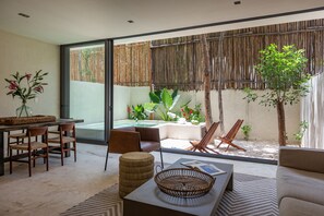 Superior Apartment, Private Pool, Courtyard View | Living area | 40-inch Smart TV with digital channels, TV, printers - Unho Tulum (Tulum)